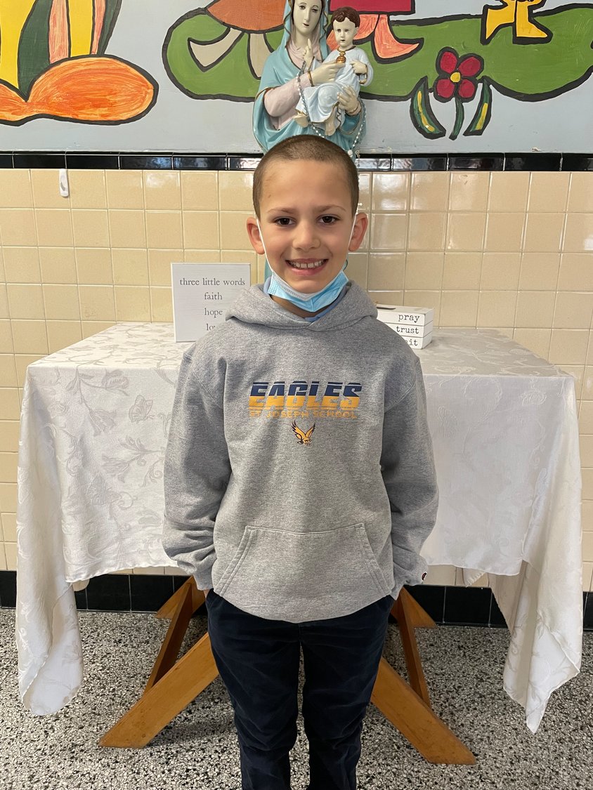 Chase Pinheiro, a new student at St. Joseph School, West Warwick, initiated a school-wide clothing drive to help those in need.